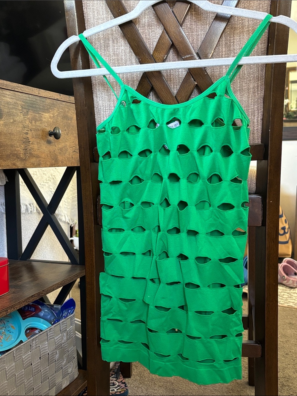 Green laser-cut camisole top is from the brand Connections. Size L/XL